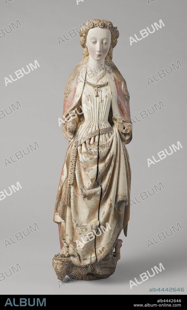 Saint Catherine of Alexandria Catherine of Alexandria, Catherine stands on her attribute Emperor Maxentius, has the gaze tilted down, holds the left forearm forwards and the right slightly downwards. On the wavy hair that falls over the shoulders, a diadem consisting of a band with 'precious stones' and some rosettes. The fur-pleated fur-lined garment, trimmed at the neck, hem and sleeves with fur trim, is placed under the left arm to reveal a second dress and the left shoe point. Around the waist a sloping belt with 'metal' end pieces, to which a rosary with tassel is tied, a wound pearl band with Tau and bell of the Hainaut Order of St. Anthony hangs over the chest. The cloak, which is received under the arms, falls off the shoulders. The prince lying over is supporting his head with the right hand. He wears an imperial crown, a fur-lined palm skirt, covers and pointed shoes. The groove around her skull assumes a crown, the virgin martyr Catherine of Alexandria, possible attributes: book, crown, emperor Maxentius, palm-branch, ring, sword, wheel, Meester van Koudewater, s Hertogenbosch, c. 1470, walnut (hardwood), gilding, h 94.0 cm × w 27.0 cm × d 23.0 cm.