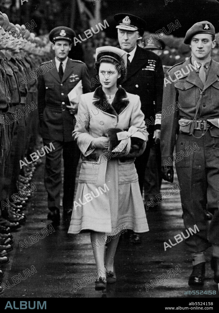 Princess Margaret and Mr. Peter Townsend.Princess Margaret and Mr. Peter Townsend photographed at launching of the "Edinburgh Castle" in Belfast in 1947. Equerry to the King, he was constantly at the young Princess' side an official engagements.The above picture catch Townsend off grand as he shows his interest in Princess Margaret at two ***** when he was a member of the *****. September 03, 1955. (Photo by Topical Press).