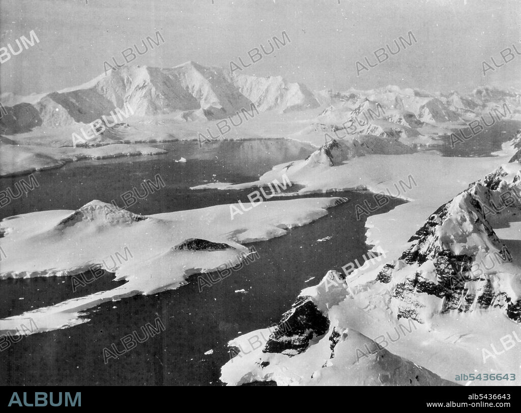 Captain Sir Hubert Wilkins stirring camera record of the second Hearst-Wilkins Antarctic Expedition. These exclusive pictures taken by Captain Sir Hubert Wilkins from an inspiring photographic record of the second Hearst-Wilkins Antarctic Expedition, revealing more of the icy secrets of that vast, mysterious and almost inaccessible polar continent. The base for the expedition was established at deception Island, an old whaling observations and taking pictures. The other members of the expedition.