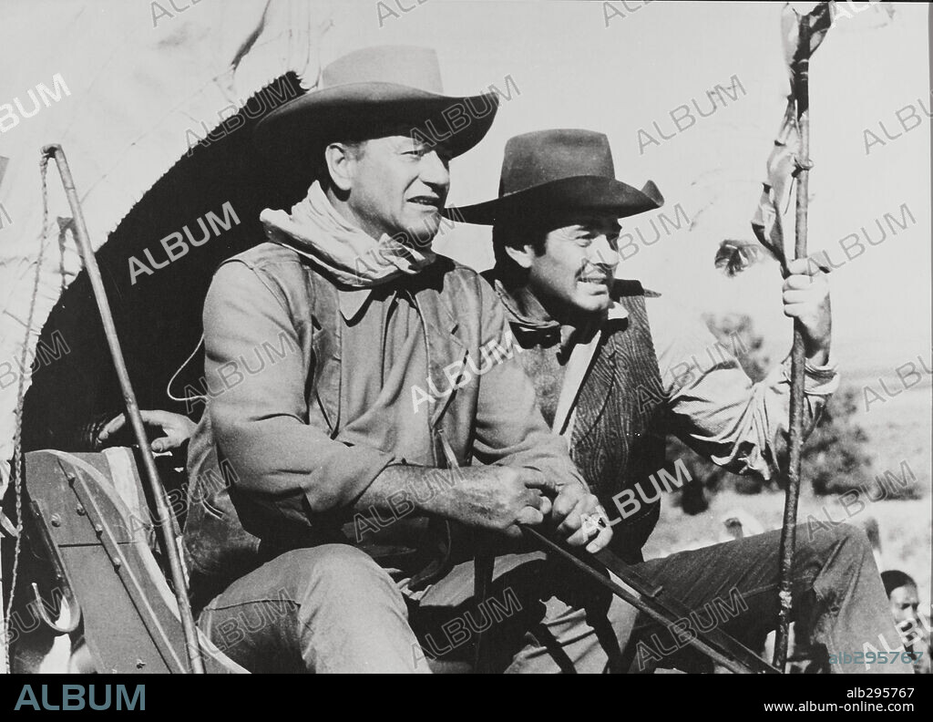 JOHN WAYNE und STUART WHITMAN in DIE COMANCHEROS, 1961 (THE COMANCHEROS), unter der Regie von MICHAEL CURTIZ. Copyright 20TH CENTURY FOX.