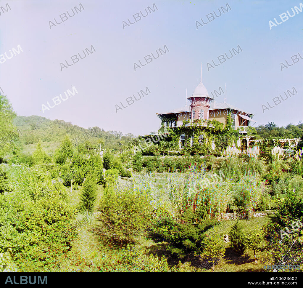 SERGEY MIKHAYLOVICH PROKUDIN-GORSKY. Type of dacha on a cultivated lot, (Russia?) between 1905 and 1915.  Russian chemist and photographer Sergey Prokudin-Gorsky (1863-1944) was a pioneer in colour photography which he used to document early 20th-century Russia and her empire, including the vanishing way of life of tribal peoples along the Silk Route in Central Asia. In a railway-carriage darkroom provided by Czar Nicholas II, Prokudin-Gorsky used the three-colour photography process to record traditional costumes and occupations, churches and mosques - many now Unesco World Heritage sites - as well as modernisation in agriculture, industry and transport.