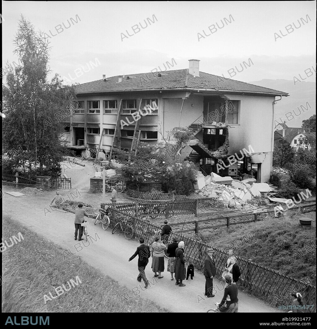 Curious onlookers visiting factory building after explosion, Stafa 1957.