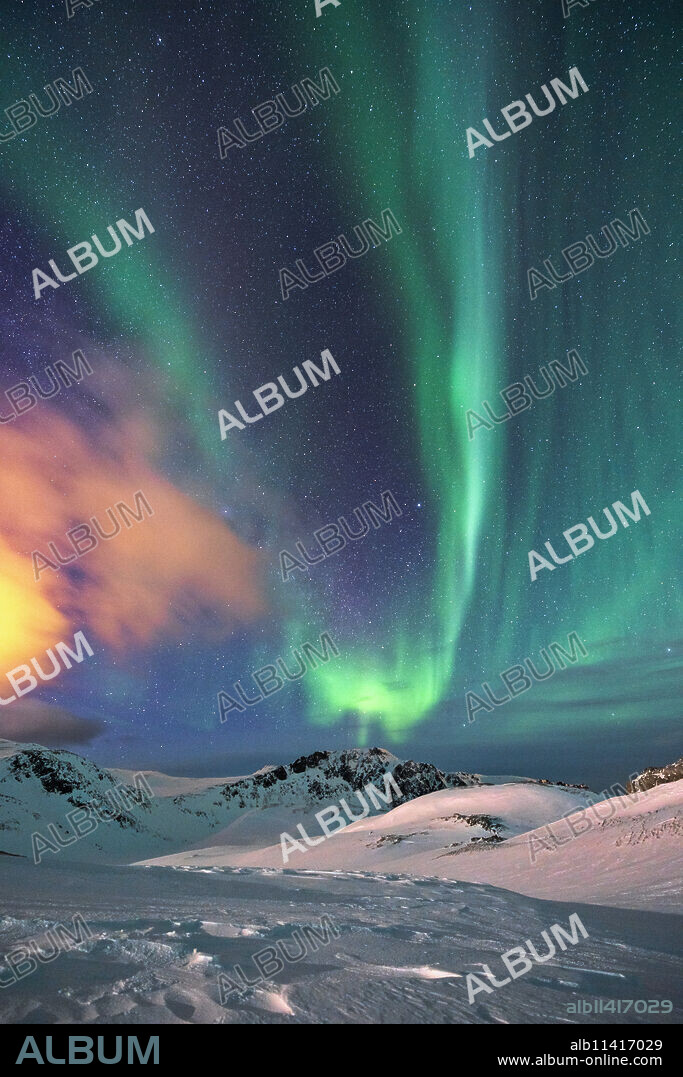 Aurora Borealis (Northern Lights) over the mountains, Finnmark, Norway, Scandinavia, Europe.