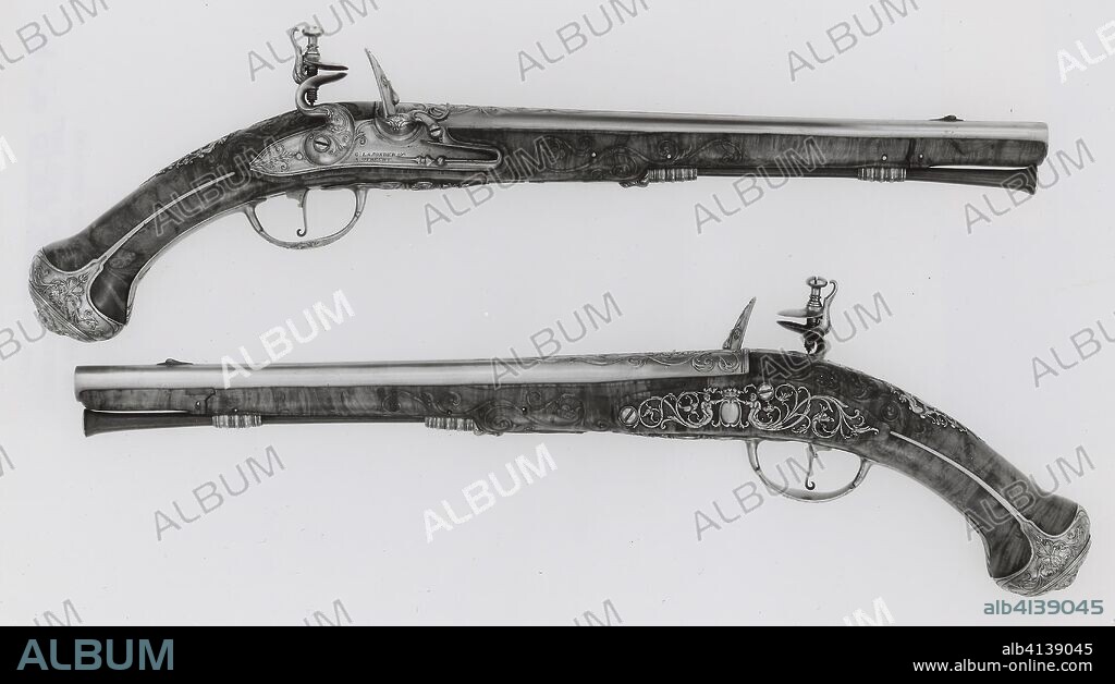 Pair of Flintlock Holster Pistols. Gunsmith: Gerrit Lasonder; (Dutch, active 1659-87); Utrecht. Date: 1665-1675. Dimensions: L. 52 cm (20 1/2 in.)
Barrel L. 34.3 cm (13 1/2 in.)
Caliber .52
Wt. 2 lb. 10 oz. Steel, copper, walnut burl. Origin: Utrecht.