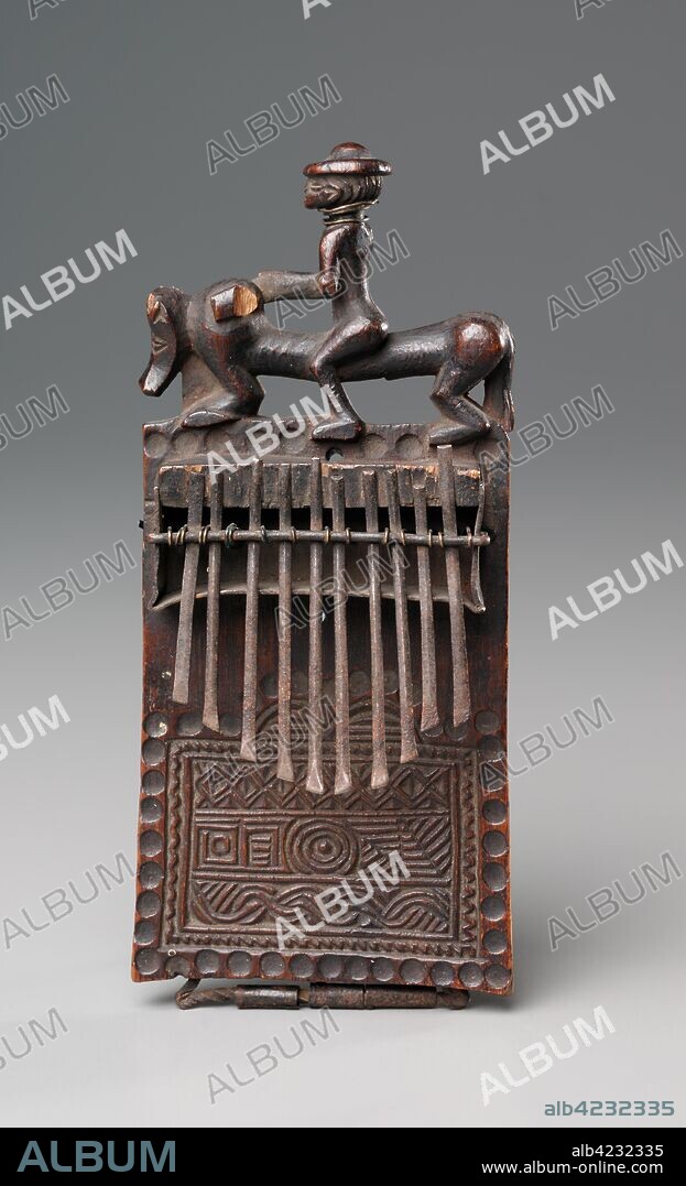 Thumb Piano, late 1800s. Central Africa, Democratic Republic of the Congo or Angola, Chokwe peoples, late 19th century. Wood and iron; overall: 19.1 x 10.2 x 6.4 cm (7 1/2 x 4 x 2 1/2 in.).