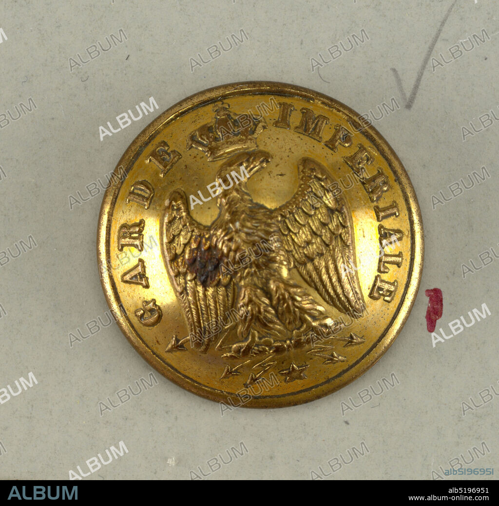 Buttons, Brass, pewter and silver foil, Crowned eagle, wings outspread, resting on bar; five arrow-tipped lighting bolts and one star beneath - words 'Garde Imperiale'., Component -a is on card H, Component -c is on card B, was not originally labeled with component, France, 185270, costume & accessories, Decorative Arts, Buttons.
