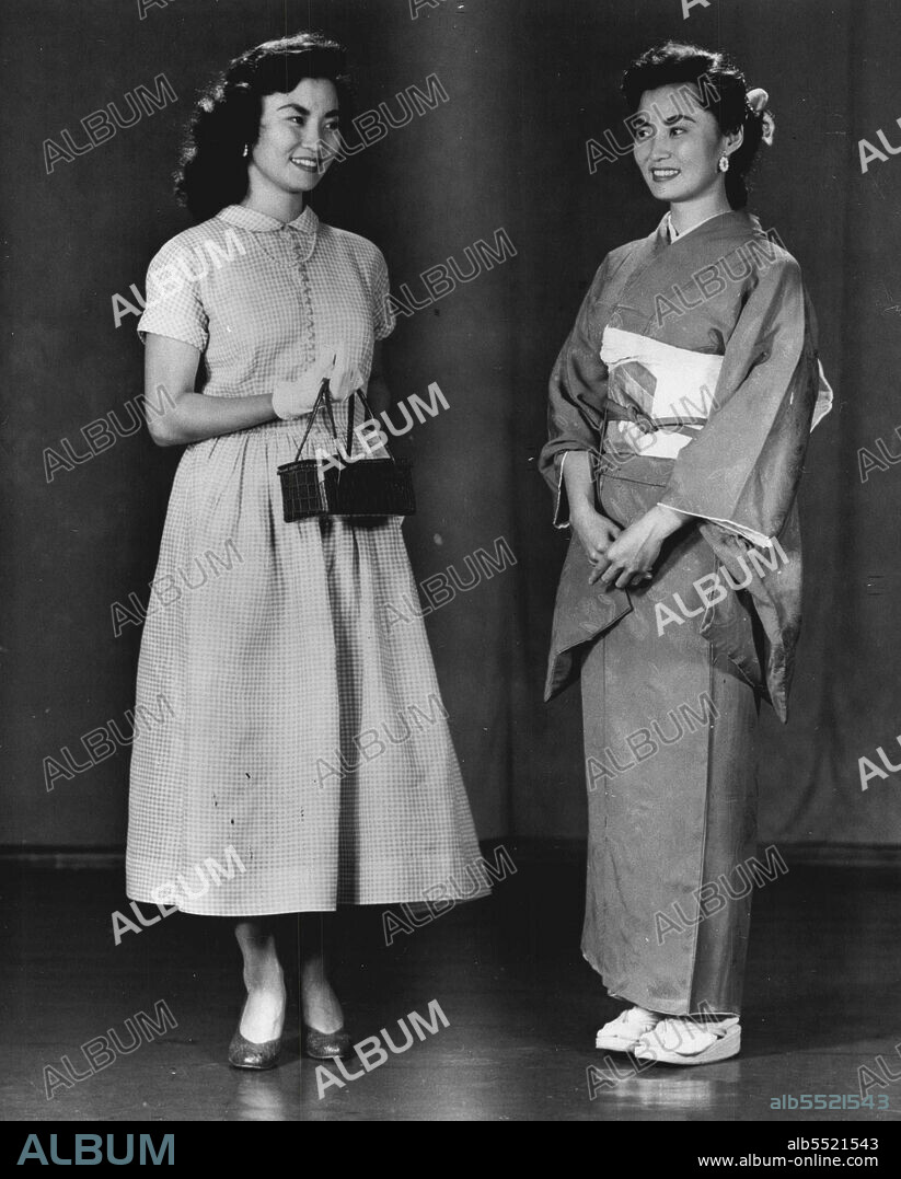 The Cam Zama School for brides does not change a Japanese wife for Fiancee, It adds dimensions to her life. The Charm of old Japan remains as new knowledge gives her a wider scope of activity. Mrs. Nochiko Rushlow symbolizes her new ability to feel at home in Tokyo or New York with these contrasting clothes. August 12, 1955. (Photo by United Press).