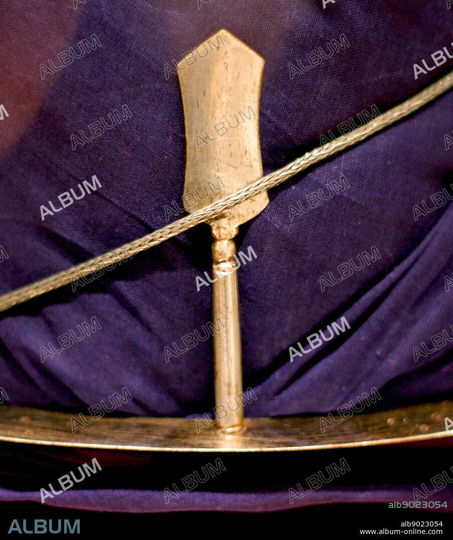 The khanda is an Indian double-edge straight sword. It was used by the Marathas, Rajputs, Jats, Nairs and Sikhs. The blade is usually broad and quite heavy and broadens from the hilt to the tip. The blade transforms into tip rather abruptly. The hilt has a small metal spike coming out in the opposite direction typical of the khanda. Many other straight swords around the world were primarily used for thrusting and stabbing with the tip, whereas the khanda was mainly used to hack or cleave with the edge of the blade.