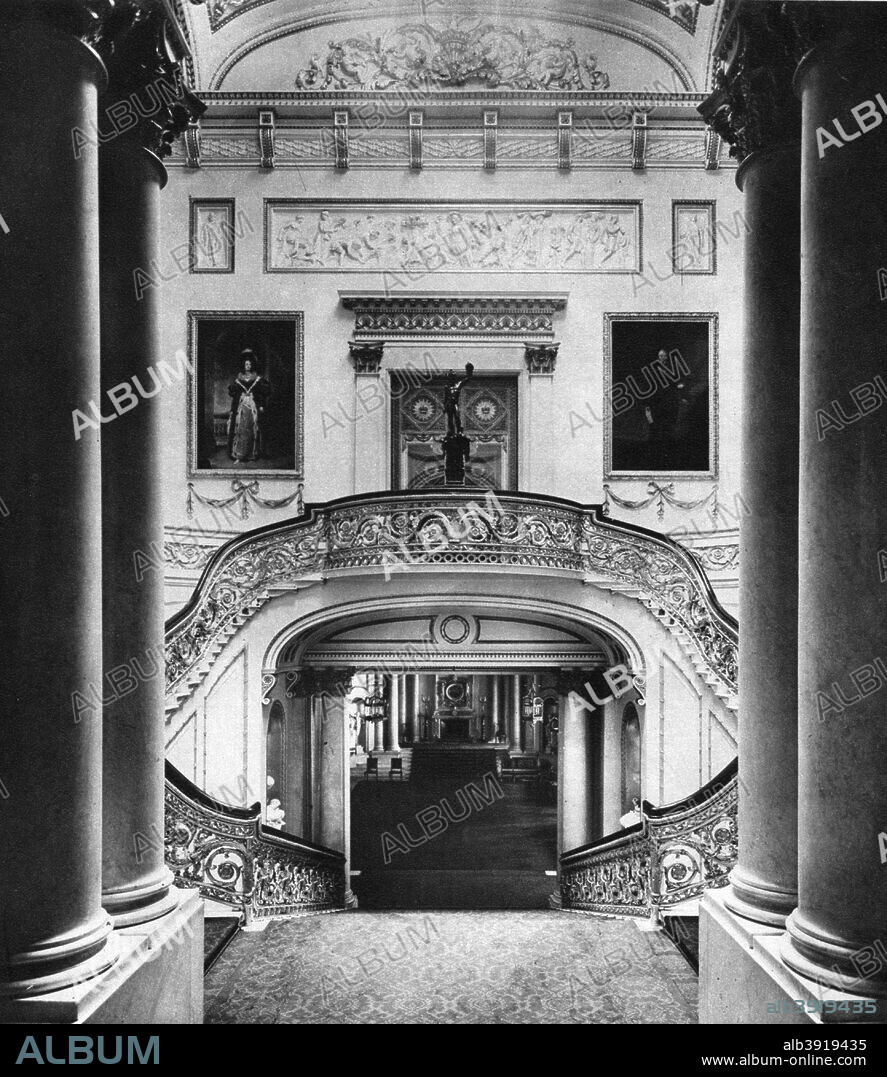 The grand staircase in Buckingham Palace, London, 1935. A print from King Emperor's Jubilee, 1910-1935, by FGH Salusbury, Daily Express Publications, London, 1935.
