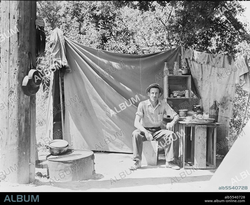DOROTHEA LANGE. Jack Neill, "migratory fruit tramp," on banks of Pulah Creek near Winters, California. He owns one acre subsistence farm near Porterville. Represented migratory laborers as speaker at Commonwealth Club, San Francisco (See published "Transactions" of the Club). Education: two years to University of Montana.