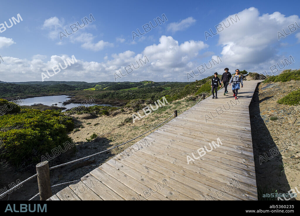 wooden walkway in Cala Tortuga and Bassa de Morella, s'Albufera des Grau Natural Park, Menorca, Balearic Islands, Spain.