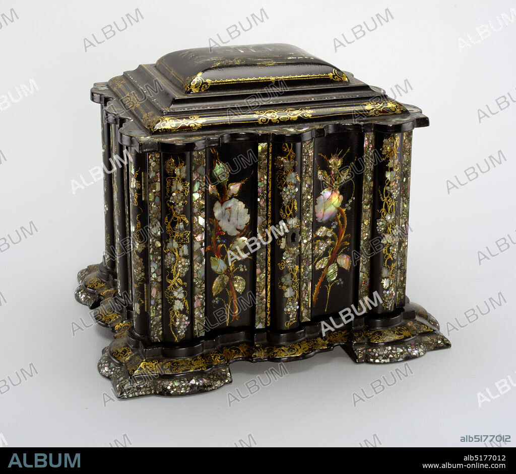 Sewing box with implements, Papier-mâché, wood, mother-of-pearl, velvet, paper, paint, gilt, ivory, Elaborately contoured square box with stepped, slightly domed, hinged lid with scalloped edges; stepped, scalloped base with four broad feet; the black lacquer ground with overall floral and foliate decoration of mother-of-pearl inlay, gilding and touches of paint; lid with scene of large church in landscape, 'Melrose Abbey' in small letters painted under scene; lid opens over compartmented top section; double doors in front open to reveal four drawers, the bottom one designed like a lap desk with hinged flap; drawer and compartment linings of silk, velvet, paper; ivory and mother-of-pearl tape measure container and emery container; small metal key., England, ca. 1850, containers, Decorative Arts, Sewing box with implements.