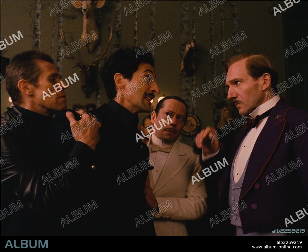 ADRIEN BRODY, RALPH FIENNES and WILLEM DAFOE in THE GRAND BUDAPEST HOTEL, 2014, directed by WES ANDERSON. Copyright AMERICAN EMPIRICAL PICTURES/INDIAN PAINTBRUSH/SCOTT RUDIN PR.