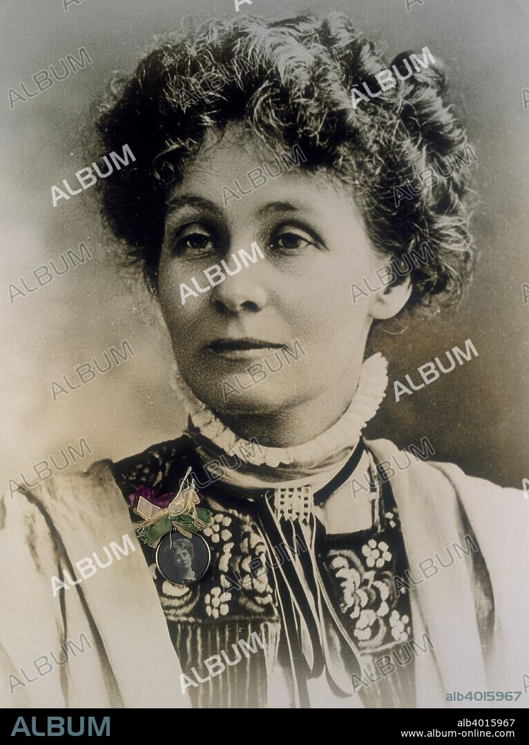 Emmeline Pankhurst, Honorary Secretary, and later Honorary Treasurer, of the WSPU, c1909. Born in Manchester from a Radical political background, Emmeline Goulden married Dr Richard Pankhurst, the 'Red Doctor', a Radical, feminist barrister. Their three daughters were all involved in the WSPU, one son died before the campaign had started, and the other died at the height of the militancy in 1910. Emmeline was a charismatic and eloquent speaker and was 'immensely popular' with the membership. By 1913 she had served three prison sentences: two in 1908 for leading a deputation to Parliament, and for inciting the public to 'rush' the House of Commons; and in the wake of the window smashing of March 1912, she was sentenced to nine months in prison for conspiracy to commit damage. Superimposed on the photograph is a portrait brooch of her, with ribbons in the suffragette colours of purple, green and white.  She is also wearing the Holloway Badge, a medal of honour designed by her daughter Sylvia, and awarded to suffragettes who had been imprisoned for their involvement in the campaign. It is an enamel arrow, also in the suffragette colours, mounted on a silver portcullis.