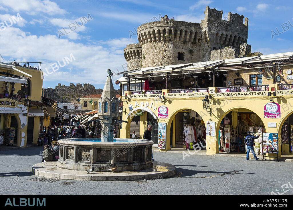 Medieval fountain at Hippokratous Square, the Medieval Old Town, UNESCO World Heritage Site, City of Rhodes, Rhodes, Dodecanese Islands, Greek Islands, Greece, Europe.