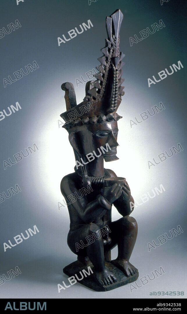 Figure (adu siraha salawa type), Nias, 19th20th century, Wood, wax, dye, and glue, Made in Sumatera Utara province, Indonesia, Oceania, Sculpture, wood, 29 15/16 x 7 1/2 x 7 1/2 in. (76 x 19 x 19 cm).