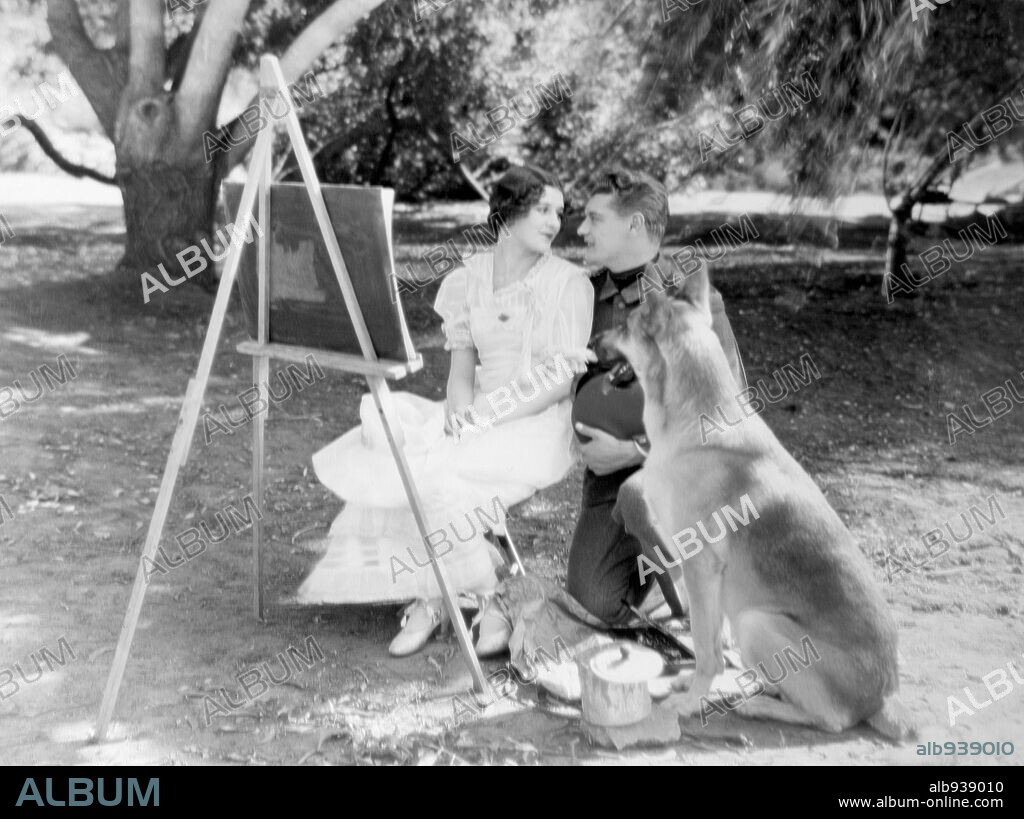MARCELINE DAY and RALPH FORBES in UNDER THE BLACK EAGLE, 1928, directed by W. S. VAN DYKE. Copyright M.G.M.