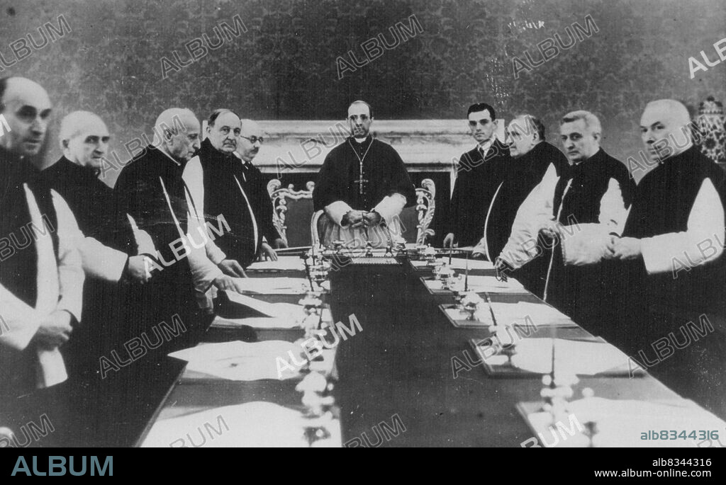 Cardinal Pacelli Elected Pope:-Photo Shows: Cardinal Pacelli Presiding over a meeting of Apostolic attendants at the Vatican just before the Conclave.Cardinal Eugenio Pacelli, Papal Secretary of State during the Pontificate of Pius XI, has been elected Pope at the Conclave in Vatican.He has chosen the name of Pius XII. March 2, 1939. (Photo by Stock).