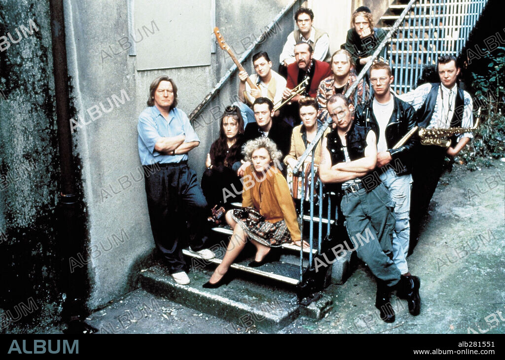 ANDREW STRONG, ANGELINE BALL, BRONAGHER GALLAGHER, DICK MASSEY, FELIM GORMLEY, GLEN HANSARD, JOHNNY MURPHY, MARIA DOYLE and ROBERT ARKINS in THE COMMITMENTS, 1991, directed by ALAN PARKER. Copyright BEACON COMMUNICATIONS/20TH CENTURY FOX.