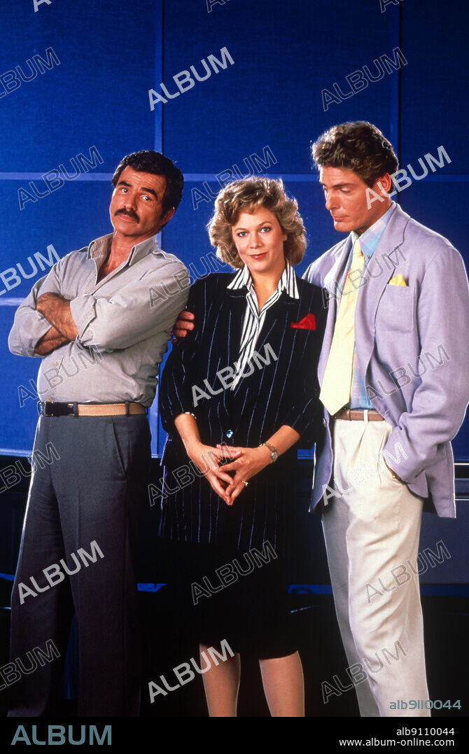 BURT REYNOLDS, CHRISTOPHER REEVE and KATHLEEN TURNER in SWITCHING CHANNELS, 1988, directed by TED KOTCHEFF. Copyright TRISTAR PICTURES.
