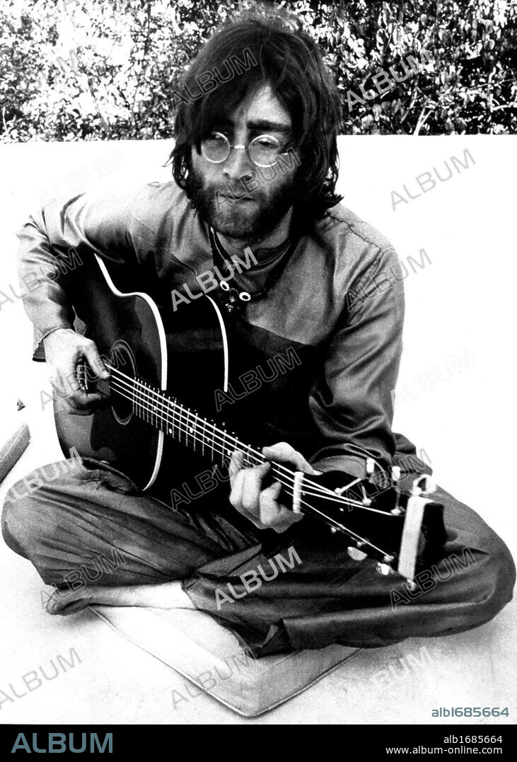 John Winston Ono Lennon, MBE, born October 9, 1940, murdered December 8, 1980, was an English songwriter, singer, musician, graphic artist, author and peace activist who gained worldwide fame as one of the founders of The Beatles.  PICTURED: (File Photo: Date Unknown) Himalaya, Tibet, China - Actor Composer Director JOHN LENNON (1940-1980) with his guitar at the meditation academy in the Himalayas. .(Credit Image: © Keystone Canada/ZUMA Press). 08/12/2005