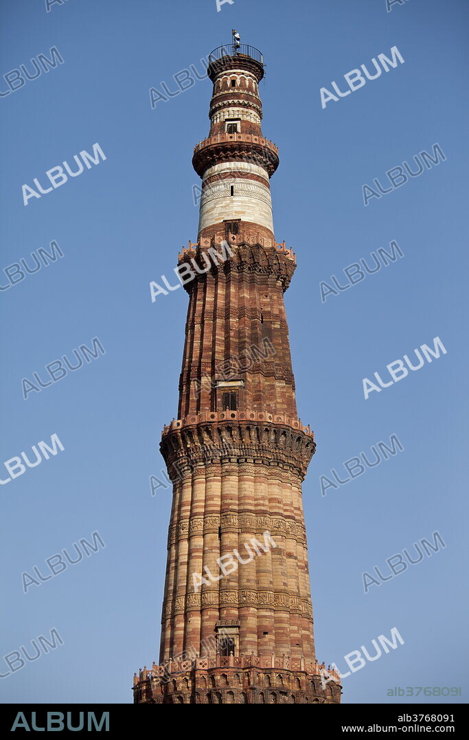 Qutub Minar minaret tower with verses from the Qur'an at Qutab Minar Complex, Unesco World Heritage Site in New Delhi, India.
