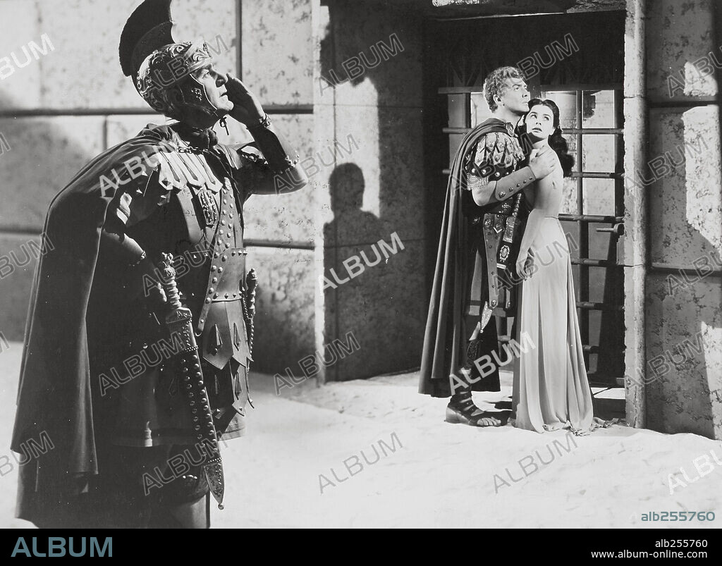 JEAN SIMMONS and VICTOR MATURE in ANDROCLES AND THE LION, 1952, directed by CHESTER ERSKINE and NICHOLAS RAY. Copyright RKO RADIO PICTURES.