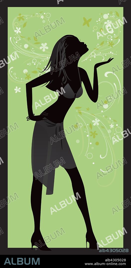 Silhouette of woman posing and blowing kiss.