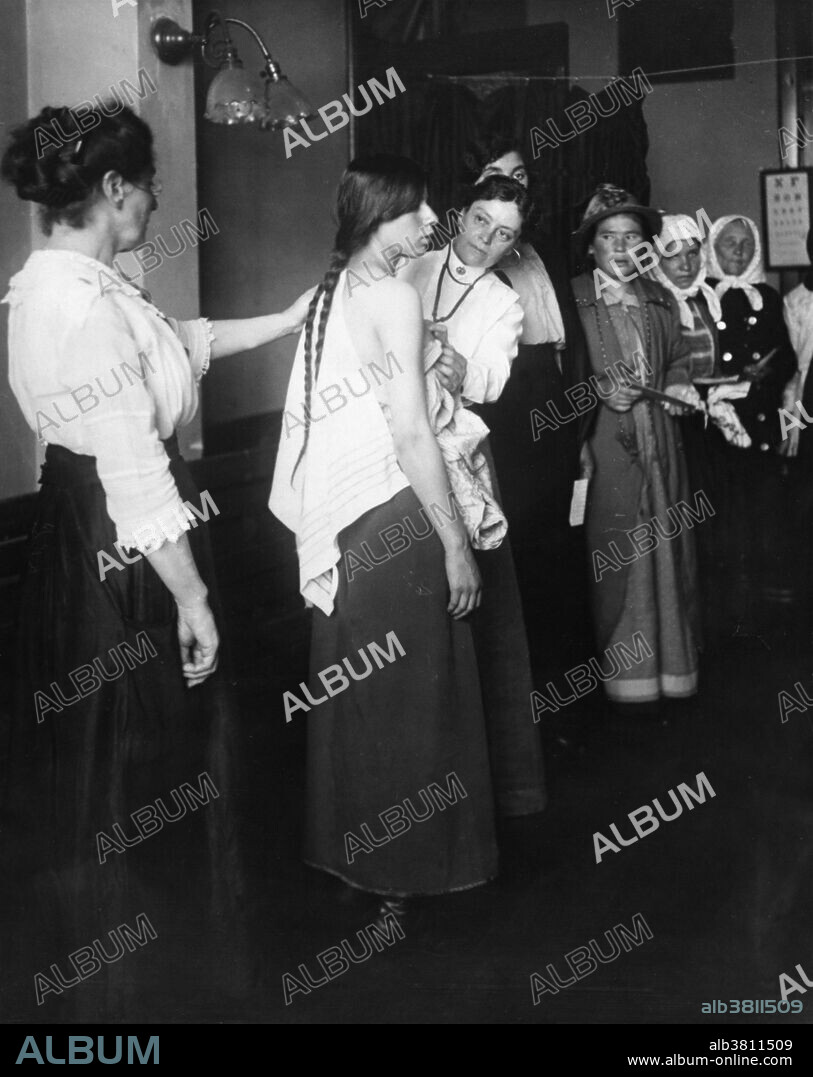 Immigrant receiving a medical exam at Ellis Island.