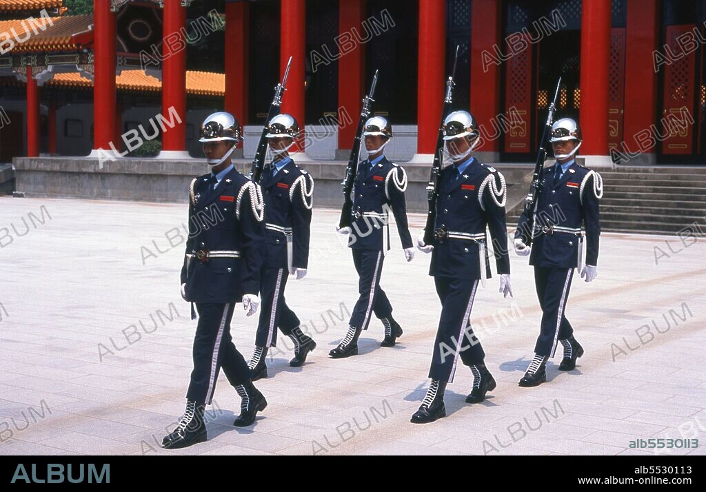 The National Revolutionary Martyrs' Shrine (Zhong Lie Ci) in Taipei is dedicated to the Republic of China's war dead. The shrine was built in 1969. Taipei was founded in the early 18th century and became an important center for overseas trade in the 19th century. The Qing Dynasty of China made Taipei the provincial capital of Taiwan in 1886. Japan acquired Taiwan in 1895 after the First Sino-Japanese War. Taiwan became a colony of Imperial Japan with Taipei as its capital. Taiwan's Japanese rulers embarked on an extensive program of advanced urban planning that featured extensive railroad links. The Republic of China took over the island in 1945 following Japanese surrender. After losing Mainland China to the Chinese Communist Party in the Chinese Civil War, the ruling Kuomintang (KMT) relocated the ROC government to Taiwan and declared Taipei the provisional capital of the Republic of China in December 1949.