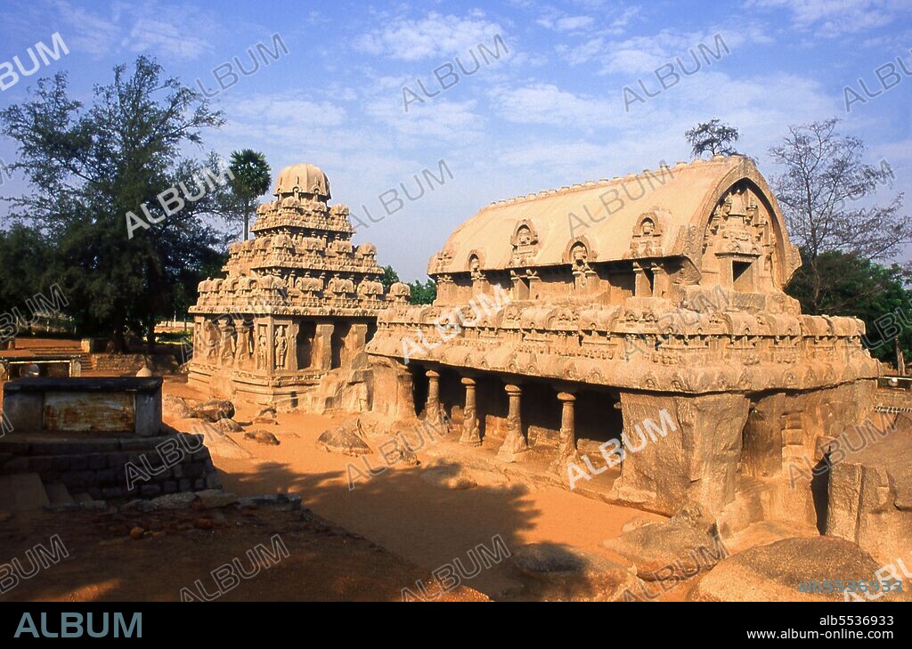 Pancha Rathas is an example of monolithic Indian rock-cut architecture. Dating from the late 7th century, it is attributed to the reign of King Mahendravarman I and his son Narasimhavarman I (630–680 CE; also called Mamalla, or 'great warrior') of the Pallava Kingdom. Mahabalipuram, also known as Mamallapuram (Tamil: ???????????) is an ancient historic town and was a bustling seaport from as early as the 1st century CE. By the 7th Century it was the main port city of the South Indian Pallava dynasty. The historic monuments seen today were built largely between the 7th and the 9th centuries CE.