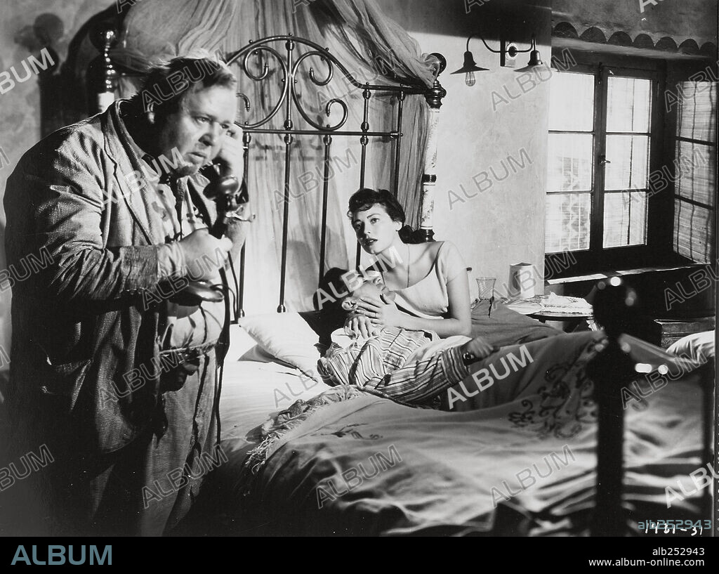 AVA GARDNER, CHARLES LAUGHTON and JOHN HODIAK in THE BRIBE, 1949, directed by ROBERT Z. LEONARD. Copyright M.G.M.