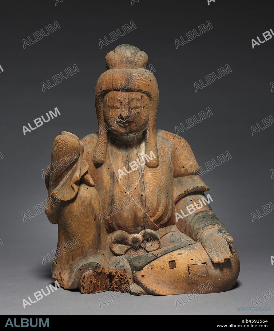 Shinto Deity, 900s. This sculpture represents a kami, the name for deities associated with the Japanese religious tradition called Shinto. It is said to have originally been created for the Usa Hachiman Shrine in Oita on the island of Kyushu. The shrine houses four main kami: Hime Okami, who assists those engaged in agriculture andsea travel; the legendary 5th-century emperor Ojin deified as the kami Hachiman; Empress Jingu; and the kami of Mount Kawara, who aids copper miners. The pose of this figure, dressed in robes reminiscent of a Tang dynasty court lady, suggests that she may have been an attending deity.