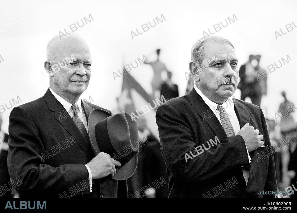 U.S. President Dwight D. Eisenhower and Puerto Rican Governor Luis Mu±oz Marn, standing with hands over their hearts, with San Juan, Puerto Rico, Marion S. Trikosko, U.S. News & World Report Magazine Photograph Collection, February 1960.