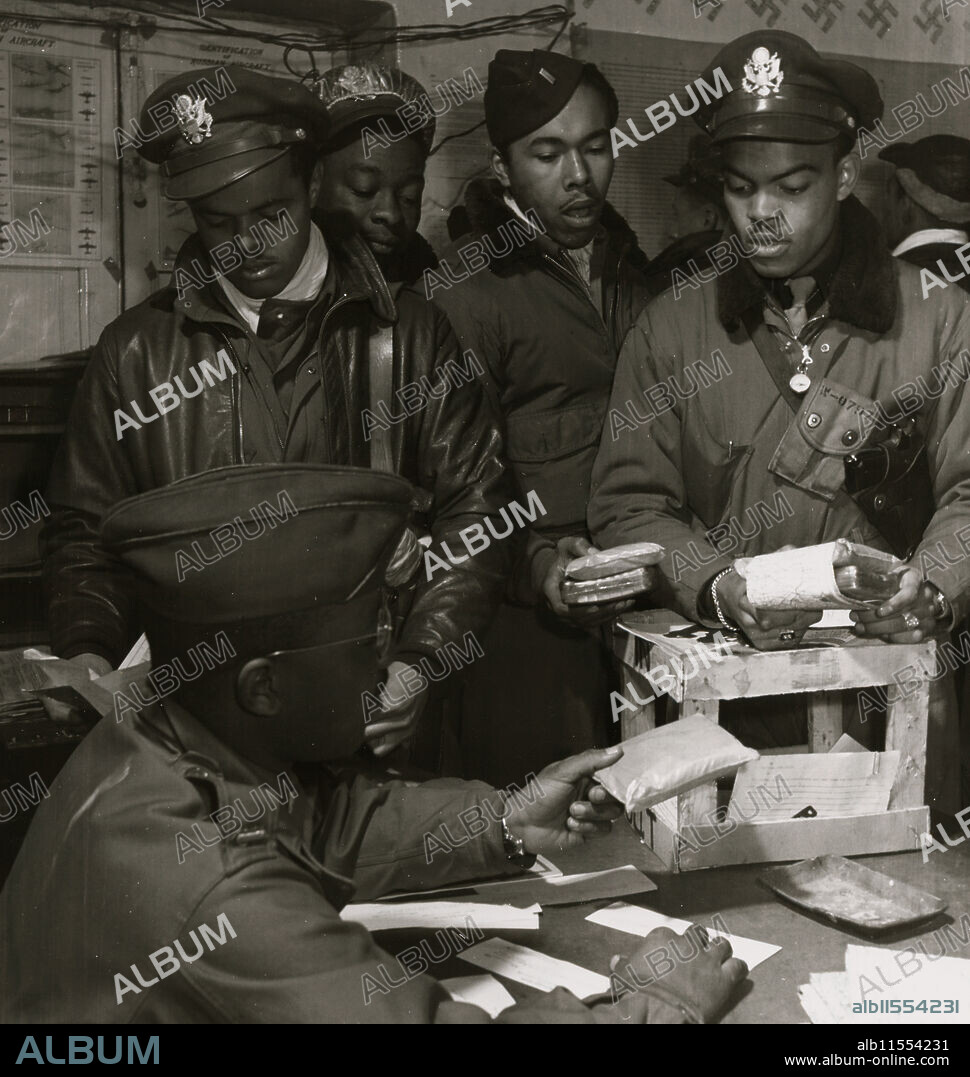 UNKNOWN. Theodore G. Lumpkin, Jr. Standing (left to right): Joseph L. "Joe" Chineworth, Memphis, TN, Class 44-E; Robert C. Robinson, Asheville, NC, Class 44-G; Driskell B. Ponder, Chicago, IL, Class 43-I; Robert W. Williams, Ottumwa, IA, Class 44-E. Ramitelli, Italy, March 1945.