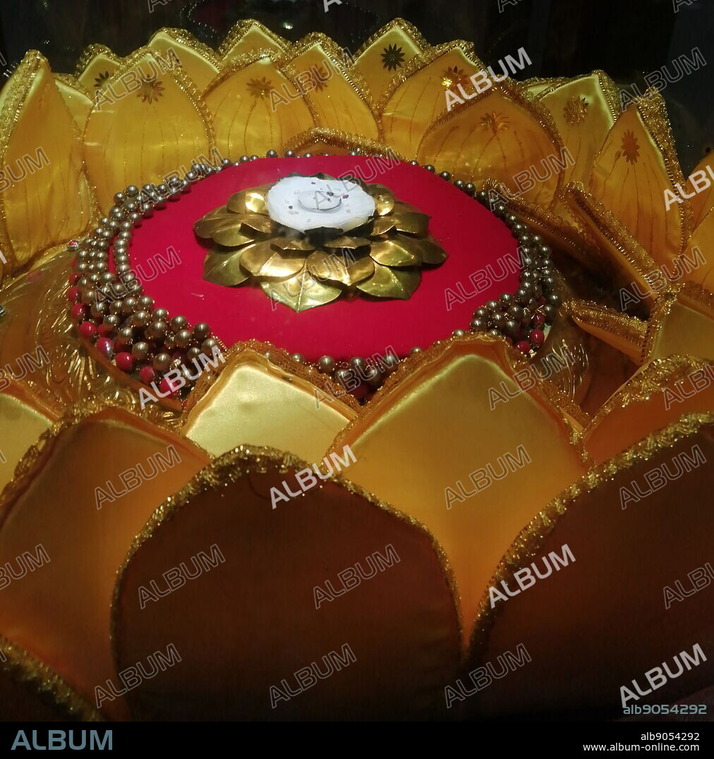 The Relic of the tooth of Buddha (Pali danta dhatuya) is venerated in Sri Lanka, as a cetiya relic of Gautama Buddha, on whose teachings Buddhism was founded. According to Sri Lankan legends, when the Buddha died in 543 BC, his body was cremated in a sandalwood pyre at Kushinagar and his left canine tooth was retrieved from the funeral pyre by his disciple, Khema. Khema then gave it to King Brahmadatte for veneration. Sri Dalada Maligawa or the Temple of the Sacred Tooth Relic is a Buddhist temple in the city of Kandy, Sri Lanka. It is located in the royal palace complex of the former Kingdom of Kandy, which houses the relic of the tooth of the Buddha.