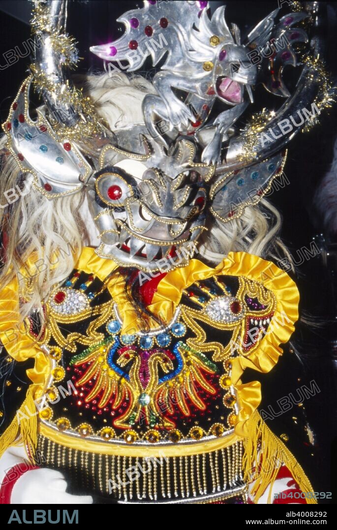 Oruro Mask, Bolivia. Mask from the Oruro region of Bolivia. La Diablada or Oruro Diablada is a typical Andean masked dance to appease the evil spirits. The slow movements represent the toil of the black slaves who worked the mines, often with little food or water. Their masks have enormous bulging eyes depicting the slaves? inability to breathe at such high altitude.
