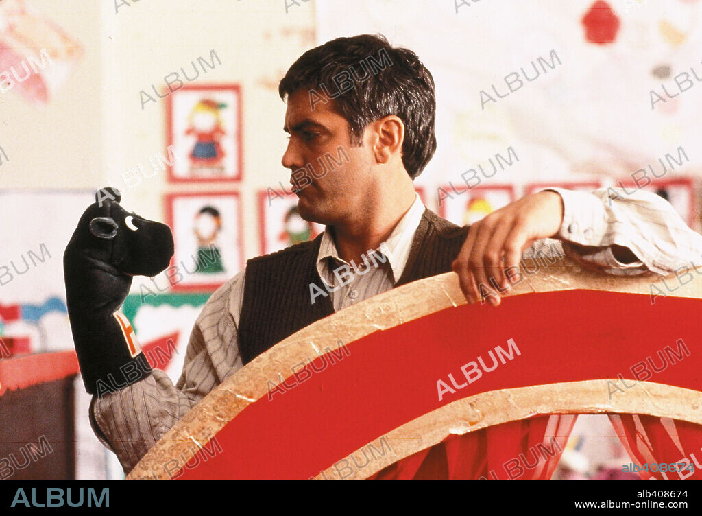 GEORGE CLOONEY in ONE FINE DAY, 1996, directed by MICHAEL HOFFMAN. Copyright 20TH CENTURY FOX / LA MANA, GEMMA.