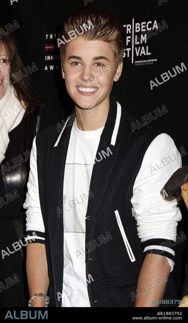 April 27, 2012 - New York, New York, U.S. - Justin Bieber arrives for the 2012 Tribeca Disruptive Innovation Awards at Paulson Auditorium at NYU in New York on April 27, 2012. 27/04/2012