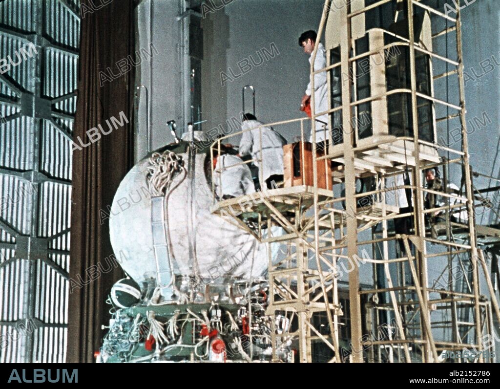 Work being done on the vostok 1 capsule in preparation for gagarin's historic flight, 1961, this is a still from a soviet film about the space program. 01/02/2013