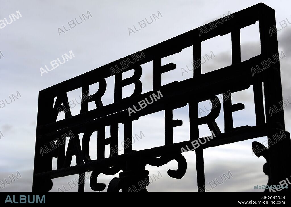 Dachau Concentration Camp. Nazi camp of prisoners opened in 1933. Detail of the slogan Arbeit macht frei (Labour makes free) at the main door. Germany.
