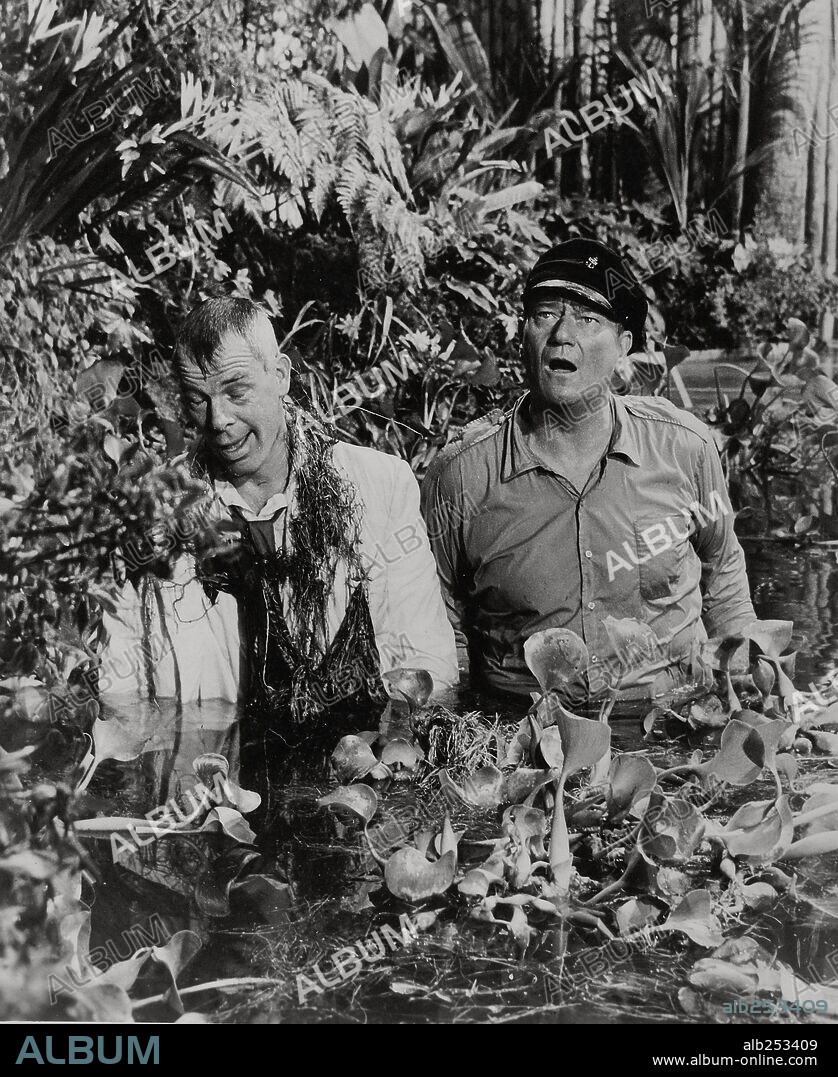 JOHN WAYNE and LEE MARVIN in DONOVAN'S REEF, 1963, directed by JOHN FORD. Copyright PARAMOUNT PICTURES.