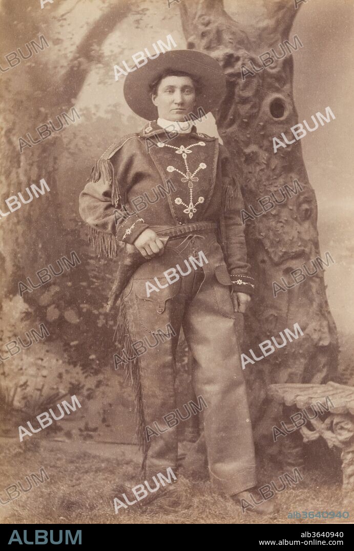 Martha "Calamity Jane" Canary: Masquerading As A Man, She Secured Employment As A Mule Skinner, And By The Time Her Sex Was Discovered She Had Proven Herself So Thoroughly That She Was Allowed To Retain Her Job. Best Remembered For Her Association With Wild Bill Hickok. Calamity Arrived In Deadwood, South Dakota In 1876. Hickok Was At That Time The Impresario Of An Informal Troop Which Demonstrated Western Skills Such As Riding And Shooting To An Appreciative Public. Her Buckskin-Clad Persona Was A Natural Fit For The Show, And For Five Weeks She Would Live The Life Of A Performer. Hickok Was Gunned Down On August 2, 1876, But Calamity Had Developed Such Affection For Wild Bill That She Mourned Him Demonstrably And Declared That She Wished To Be Buried Beside Him When Her Time Came. Her Wish Would Be Granted 27 Years Later, And Modern-Day Tourists Flock To See The Two Graves In Deadwood., Baker and Johnston, 1890.