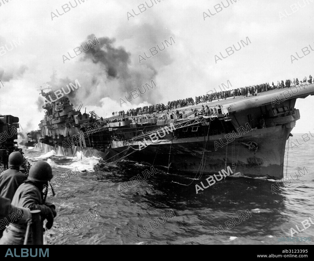 Aircraft carrier USS Franklin (CV-13) attacked by Japanese navy, during World War II, March 19, 1945.