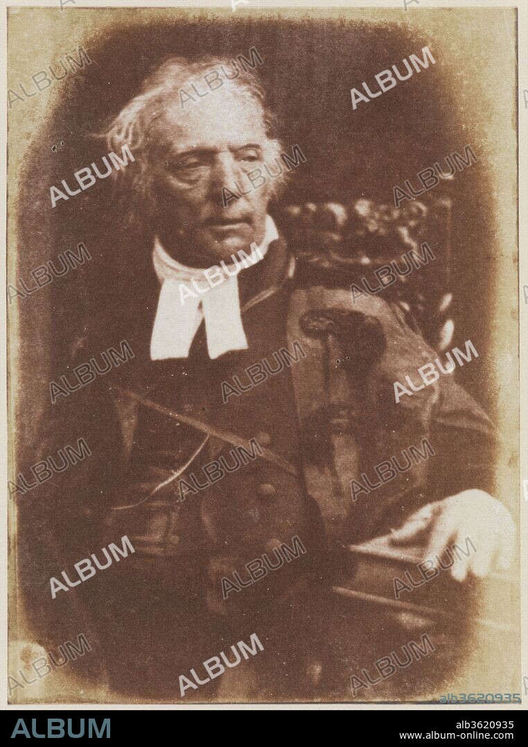 Rev. Dr. Thomas Chalmers. Artist: David Octavius Hill (British, Perth, Scotland 1802-1870 Edinburgh, Scotland); Robert  Adamson (British, St. Andrews, Scotland 1821-1848 St. Andrews, Scotland). Dimensions: 16.1 x 11.9 cm (6 5/16 x 4 11/16 in.). Photography Studio: Hill and Adamson (British, active 1843-1848). Date: ca. 1843.
In 1843, four hundred ministers of the Church of Scotland met in Edinburgh to sign the Deed of Demission, resigning their positions and privileges in order to establish the Free Church of Scotland. Inspired by the event, the painter Hill determined to create a large commemorative painting portraying everyone present at the signing.  Realizing that the ministers would soon leave Edinburgh to return to their parishes throughout Scotland, Hill sought the aid of a local photographer, Robert Adamson, to create individual photographs of the ministers that could serve later as guides for the portraits in the painting. The dramatically lit and psychologically engaging portraits that this painter-and-photographer team produced far outshone Hill's enormous, tedious painting, in which the accumulation of faces diminished the power of each.
