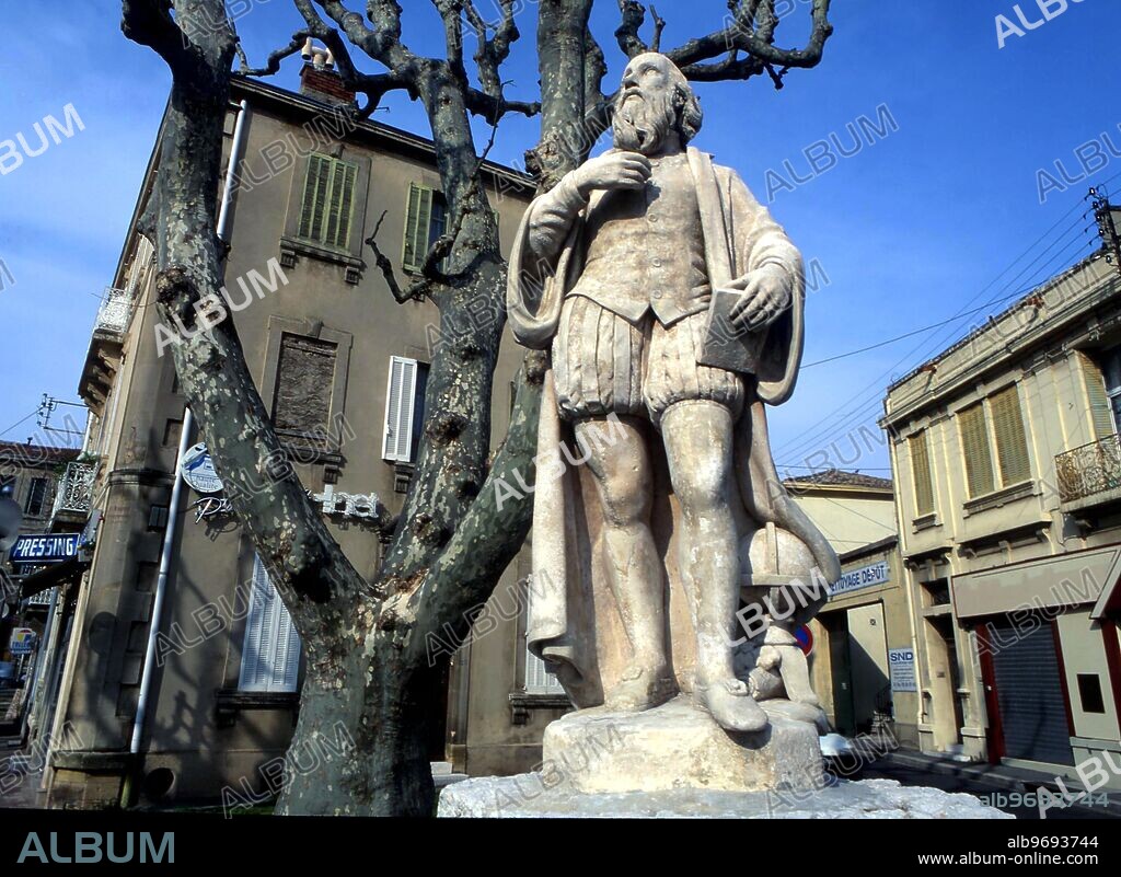 OCCULTISTS - NOSTRADAMUS. Statue of Nostradamus in Salon, the town where he lived and died. The statue is in Place de Gaule, and was sculpted in stone by Joseph Re, in 1867.