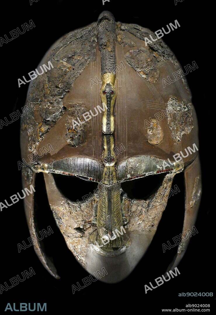 reconstruction of the Sutton Hoo helmet, a decorated Anglo-Saxon helmet discovered during the 1939 excavation of the Sutton Hoo ship-burial. Buried around 625 AD. it is believed to have been the helmet of King Raedwald; for whom its elaborate decoration may have given it a secondary function almost akin to a crown.