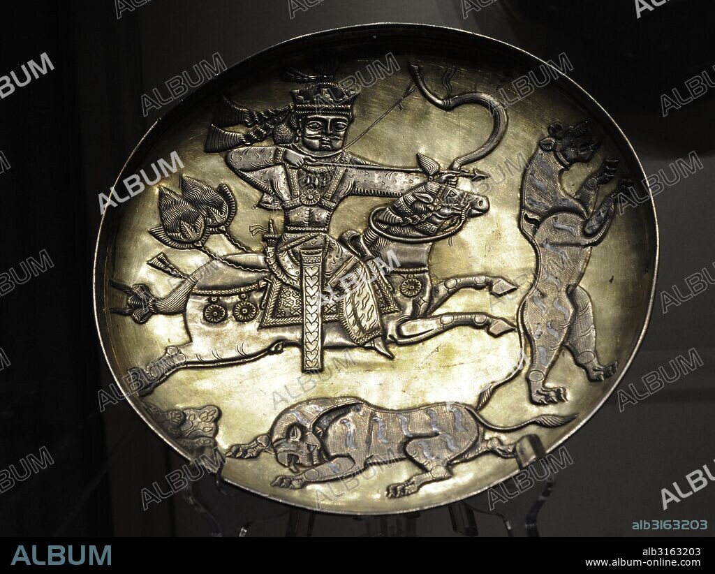 Sasanian Empire. Plate with the king hunting predators. Silver; chasing, gilding. Iran. 7th century. Found as part of a treasure in Perm Region. The State Hermitage Museum. Saint Petersburg. Russia.