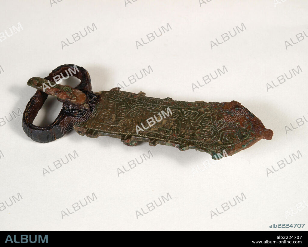 *** Local Caption *** Broche de cinturón liriforme. Siglo VII d. C. Necrópolis de Gózquez de Arriba, San Martín de la Vega, Madrid. Museo Arqueológico Regional. Comunidad de Madrid.