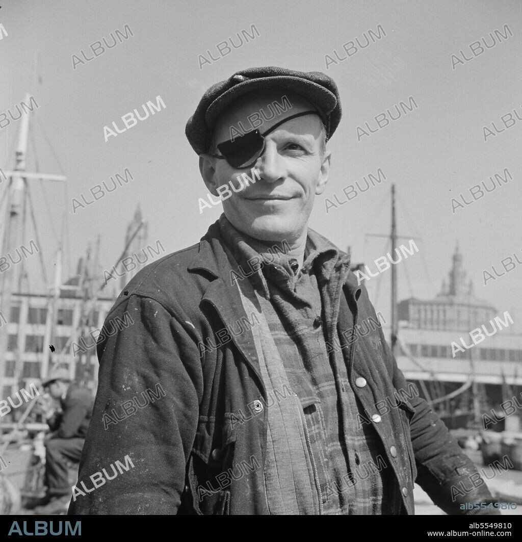 GORDON PARKS. New York, New York. Dock stevedore at the Fulton fish market.